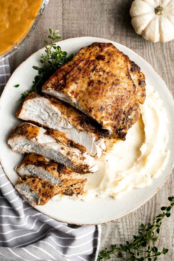 Instant pot turkey breast is the most tender and juicy turkey you’ll ever try. It's so easy to make in the pressure cooker and requires little prep. | aheadofthyme.com