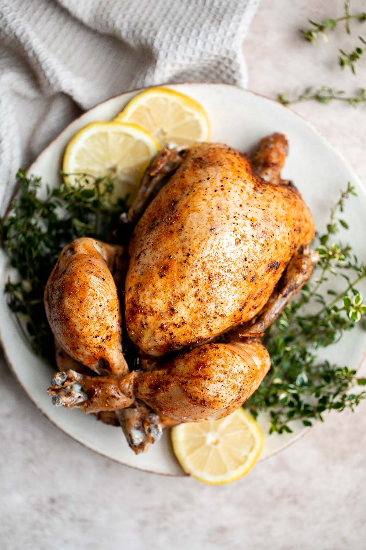 Instant pot whole chicken with gravy is tender, juicy, and flavorful. It's the fastest way to cook a whole rotisserie chicken for dinner in just 40 minutes. | aheadofthyme.com