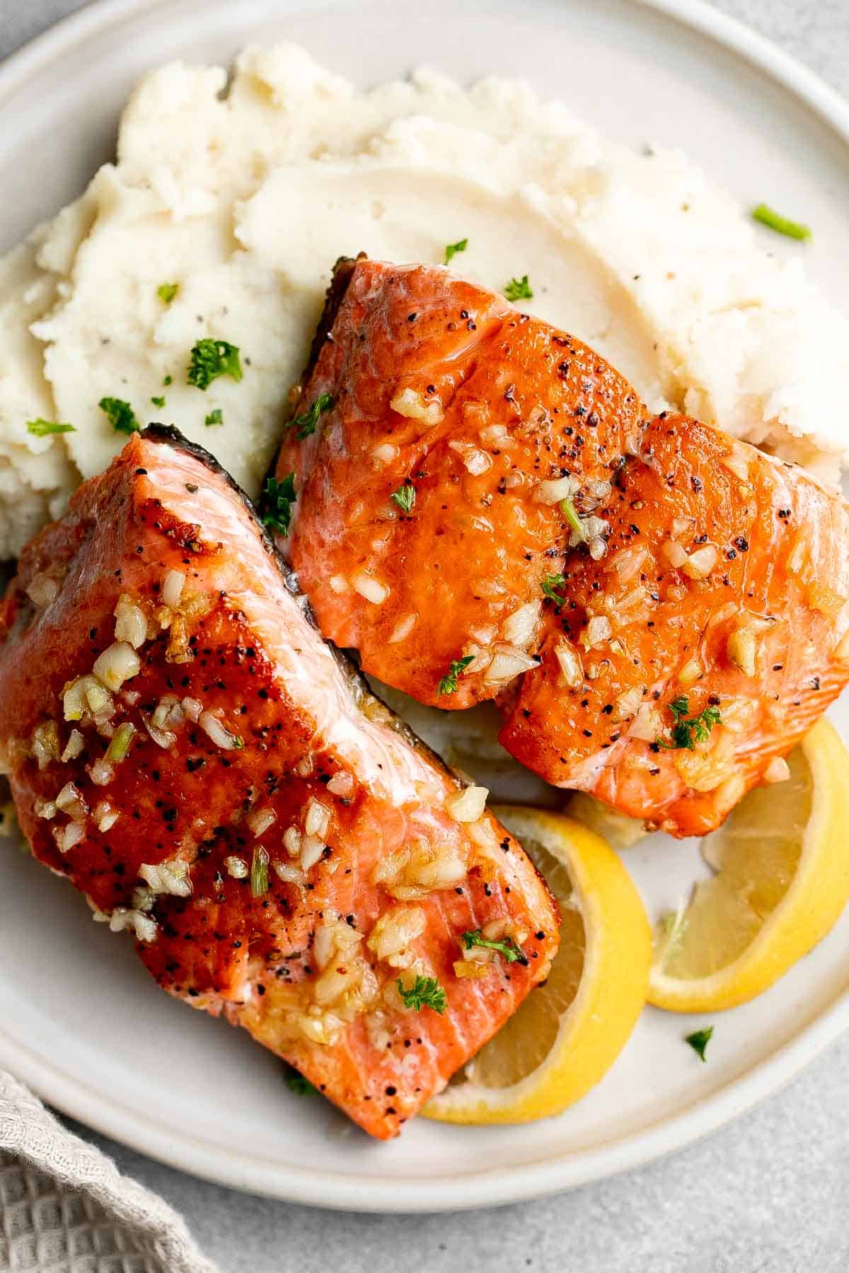 Pan-seared garlic butter salmon is tender, flaky, and flavorful. An easy 20-minute recipe with lemon and parsley, perfect for weeknights. | aheadofthyme.com