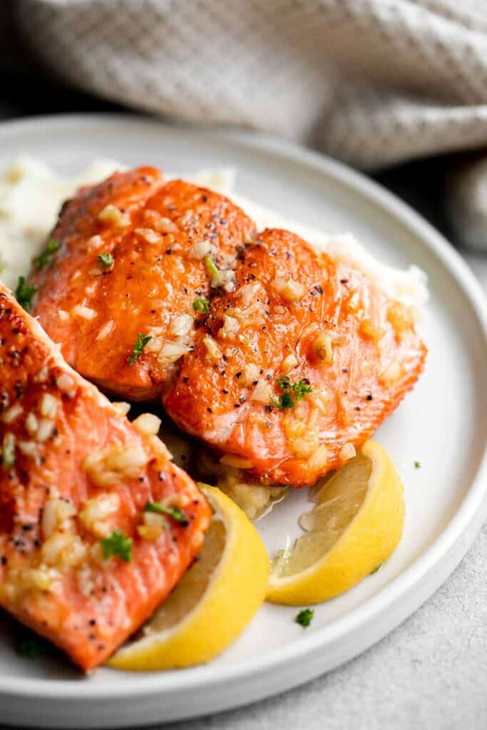 Pan-seared garlic butter salmon is tender, flaky, and flavorful. An easy 20-minute recipe with lemon and parsley, perfect for weeknights. | aheadofthyme.com