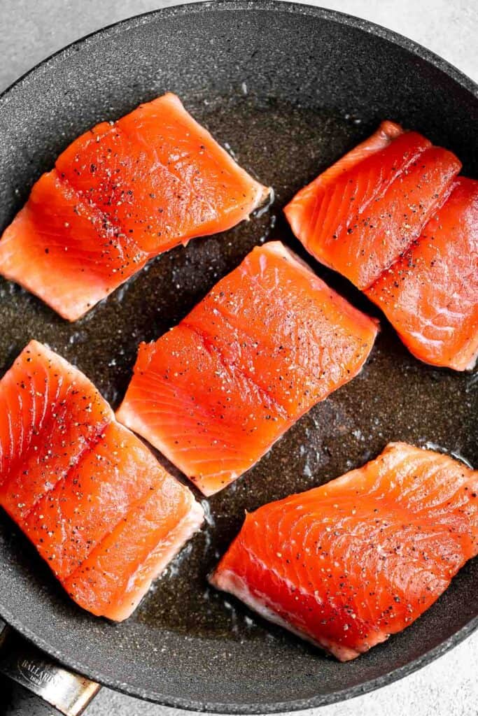 Pan-seared garlic butter salmon is tender, flaky, and flavorful. An easy 20-minute recipe with lemon and parsley, perfect for weeknights. | aheadofthyme.com