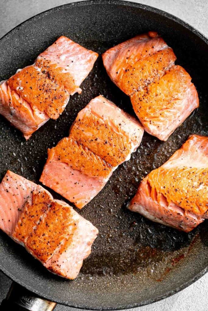 Pan-seared garlic butter salmon is tender, flaky, and flavorful. An easy 20-minute recipe with lemon and parsley, perfect for weeknights. | aheadofthyme.com
