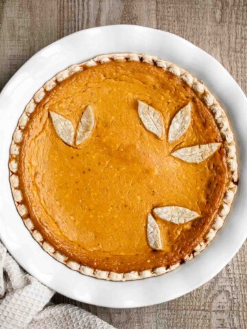 Pumpkin mascarpone pie is a warm and cozy holiday dessert that is incredibly easy to make with just minutes of prep work before popping into the oven. | aheadofthyme.com
