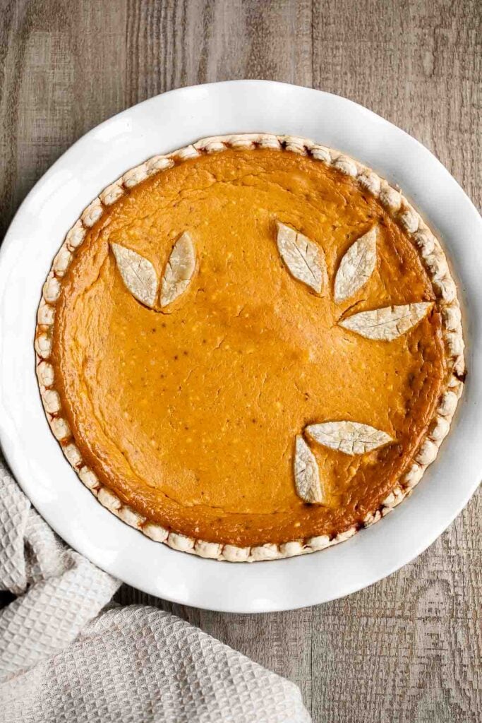 Pumpkin mascarpone pie is a warm and cozy holiday dessert that is incredibly easy to make with just minutes of prep work before popping into the oven. | aheadofthyme.com