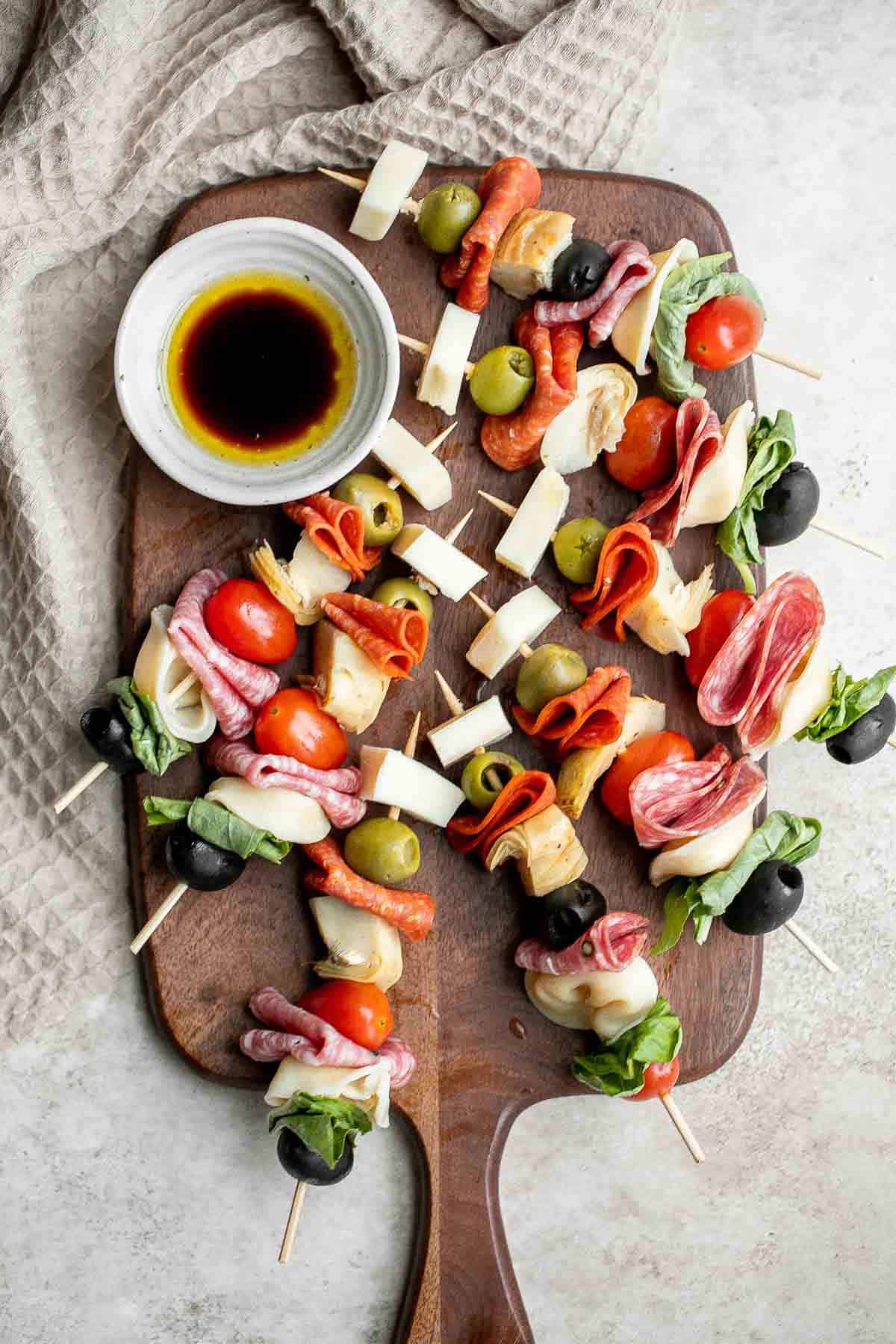 Antipasto skewers with tortellini are a quick, easy, and delicious appetizer with the best parts of a traditional antipasto platter but easier to eat. | aheadofthyme.com