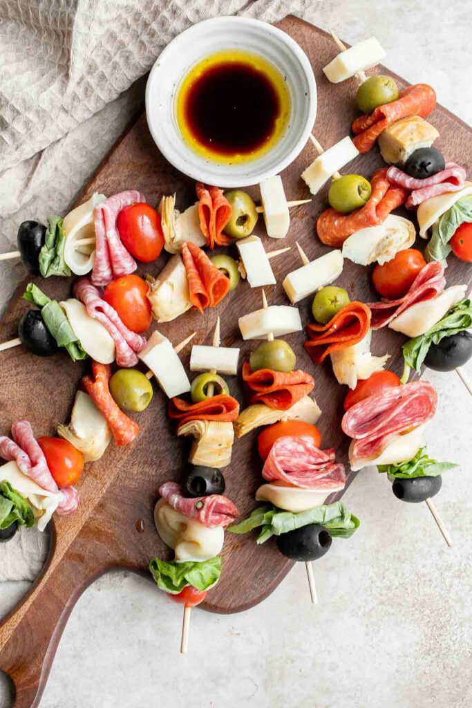 Antipasto skewers with tortellini are a quick, easy, and delicious appetizer with the best parts of a traditional antipasto platter but easier to eat. | aheadofthyme.com