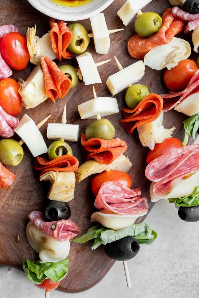 Antipasto skewers with tortellini are a quick, easy, and delicious appetizer with the best parts of a traditional antipasto platter but easier to eat. | aheadofthyme.com