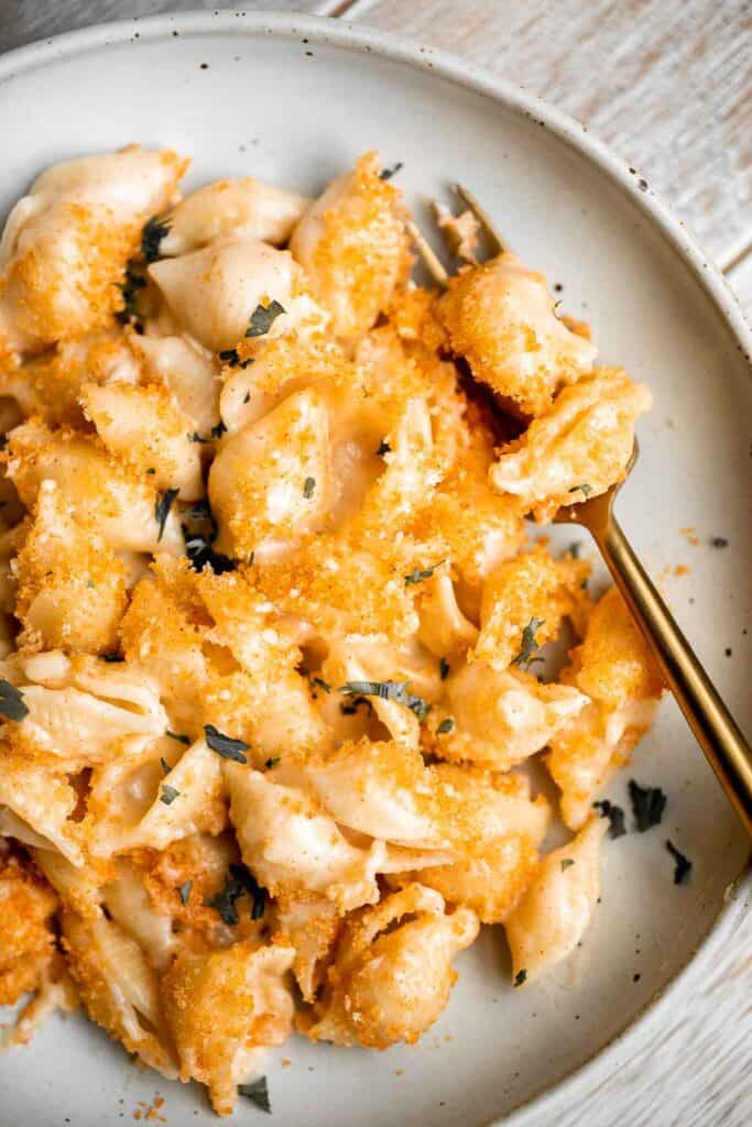 Brie mac and cheese takes traditional macaroni and cheese to the next level. It's creamy, comforting, delicious, and easy to make in about 30 minutes. | aheadofthyme.com
