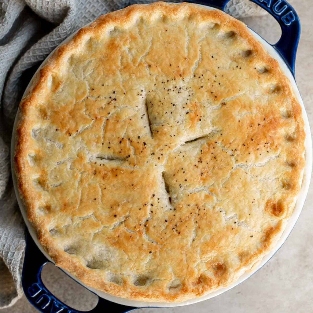 Homemade chicken pot pie is loaded with a delicious, creamy, savory filling contained by a crispy, buttery, and flaky pie crust. It stores and freezes well. | aheadofthyme.com