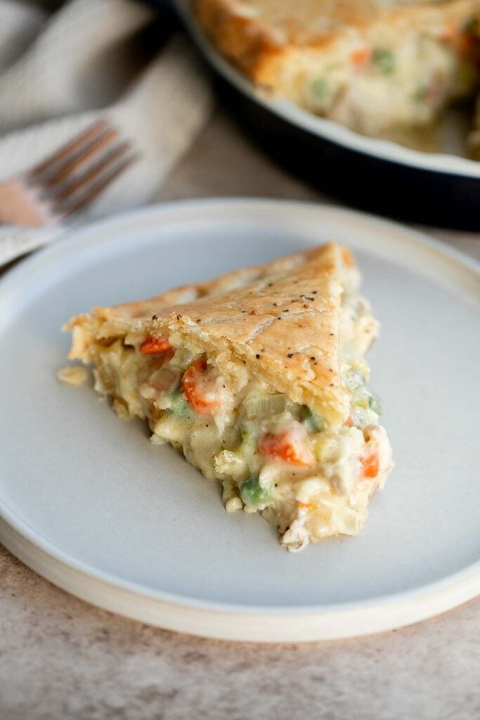 Homemade chicken pot pie is loaded with a delicious, creamy, savory filling contained by a crispy, buttery, and flaky pie crust. It stores and freezes well. | aheadofthyme.com