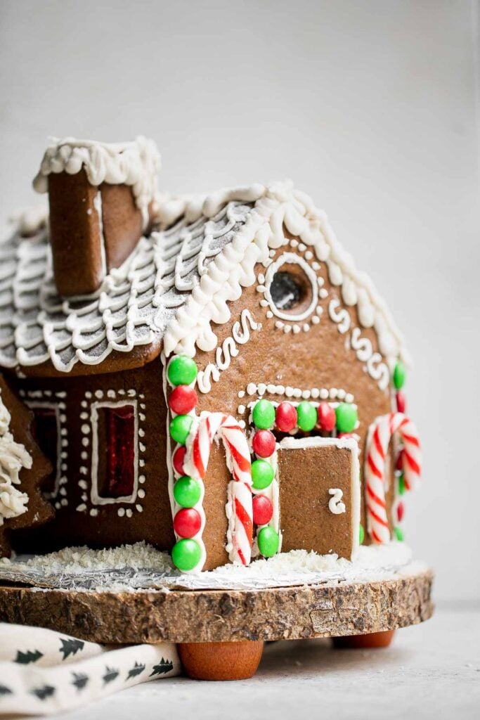 This gingerbread house recipe with template is easy to make, fun to decorate, and delicious — soft and chewy, yet crunchy and sturdy with crisp edges. | aheadofthyme.com