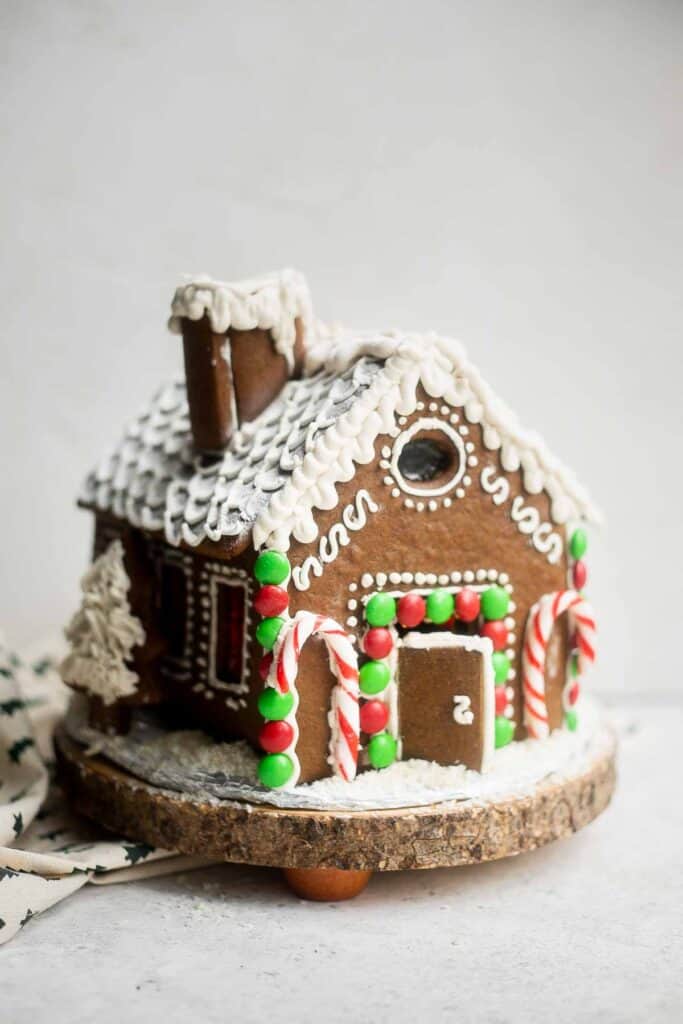 This gingerbread house recipe with template is easy to make, fun to decorate, and delicious — soft and chewy, yet crunchy and sturdy with crisp edges. | aheadofthyme.com