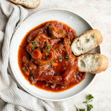 Instant pot osso buco is a delicious, classic Italian recipe with braised veal shanks stewed with vegetables in a thick, savory red wine and tomato sauce. | aheadofthyme.com