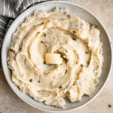 Mashed red potatoes are a simple and easy side dish with elegant flavor and plenty of nutrition. They are creamy, comforting, and have the best texture. | aheadofthyme.com