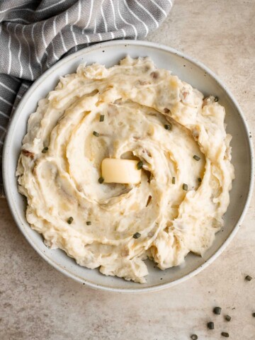 Mashed red potatoes are a simple and easy side dish with elegant flavor and plenty of nutrition. They are creamy, comforting, and have the best texture. | aheadofthyme.com