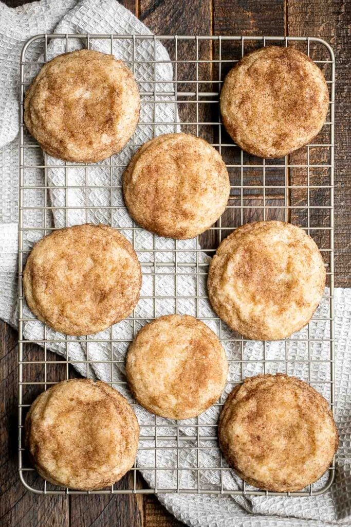 Snickerdoodles are a classic holiday cookie that are soft, puffy, and chewy with crisp edges and a cinnamon-sugar coating. Easy to make and easy to eat. | aheadofthyme.com