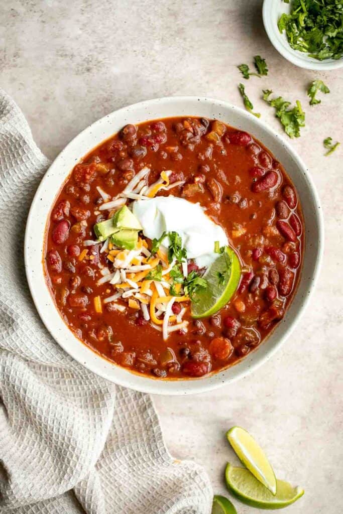 Easy one pot vegetarian chili is the perfect warm and cozy comfort meal — it’s hearty, filling, wholesome, flavorful, delicious, and loaded with protein. | aheadofthyme.com