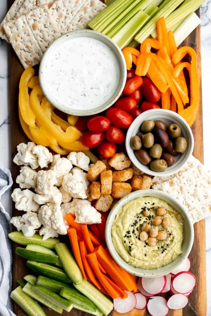 This homemade veggie tray is a quick easy healthy snack or appetizer to make for your next party, with a variety of colorful vegetables and delicious dips. | aheadofthyme.com