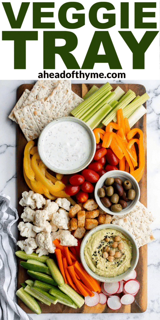 This homemade veggie tray is a quick easy healthy snack or appetizer to make for your next party, with a variety of colorful vegetables and delicious dips. | aheadofthyme.com