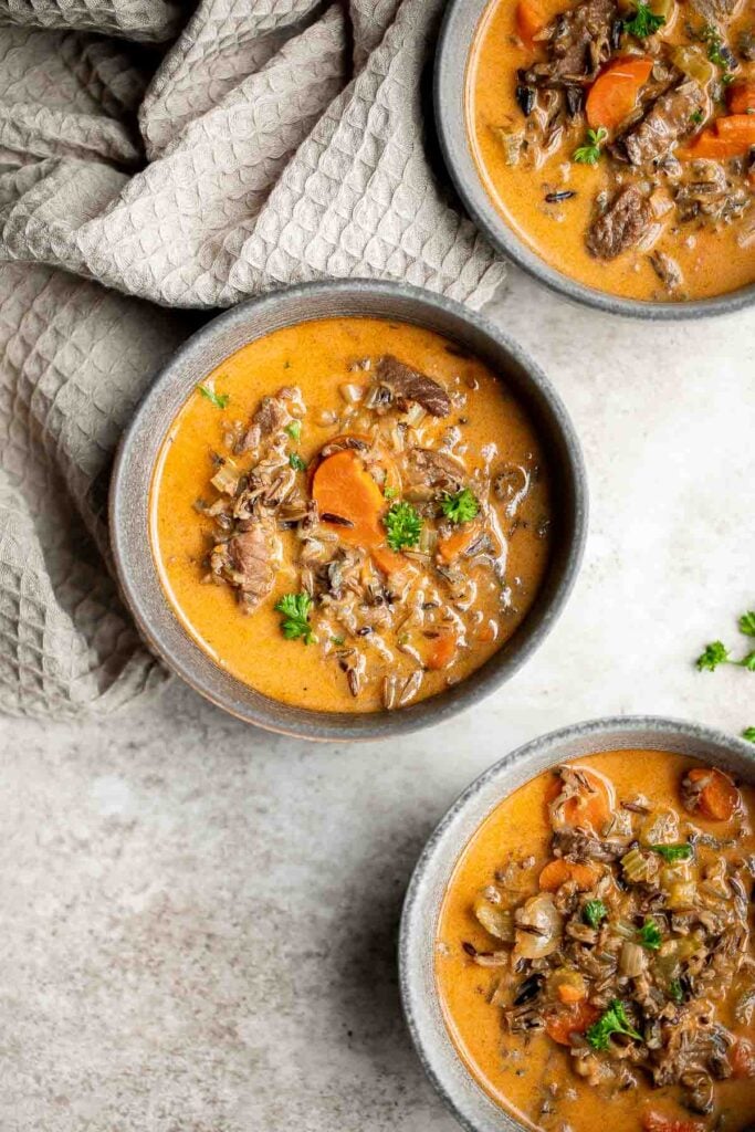 Creamy beef wild rice soup is savory, flavorful, and delicious, packed with vegetables and beef flank steak (or leftover roast beef!), and freezes well. | aheadofthyme.com