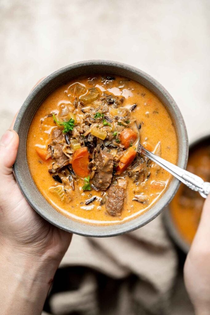 Creamy beef wild rice soup is savory, flavorful, and delicious, packed with vegetables and beef flank steak (or leftover roast beef!), and freezes well. | aheadofthyme.com