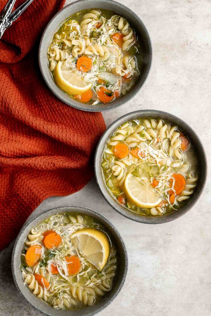 Homemade chicken noodle soup is classic, comforting, simple, quick, and easy to make at home. Plus, you can use leftover rotisserie chicken to save time. | aheadofthyme.com