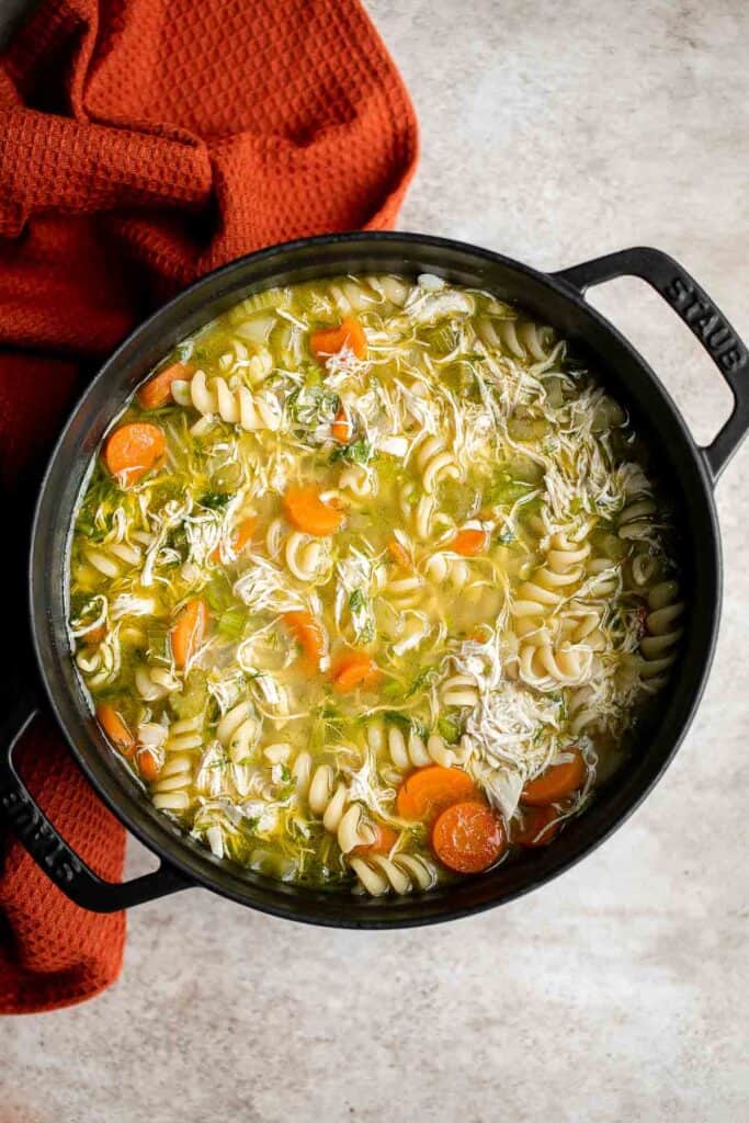 Homemade chicken noodle soup is classic, comforting, simple, quick, and easy to make at home. Plus, you can use leftover rotisserie chicken to save time. | aheadofthyme.com