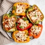 Chicken parmesan stuffed peppers are delicious, flavorful, healthy, and filling, and combines two all-time favorites. Great for meal prep and freezes well. | aheadofthyme.com