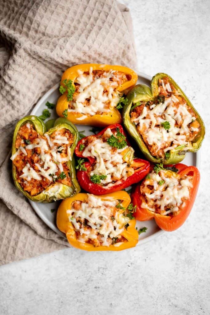 Chicken parmesan stuffed peppers are delicious, flavorful, healthy, and filling, and combines two all-time favorites. Great for meal prep and freezes well. | aheadofthyme.com