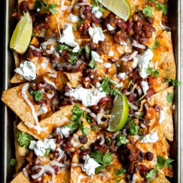 Homemade chili nachos are crispy, cheesy, delicious, and flavorful. This modern twist on a Mexican classic are the best way to use up any leftover chili. | aheadofthyme.com