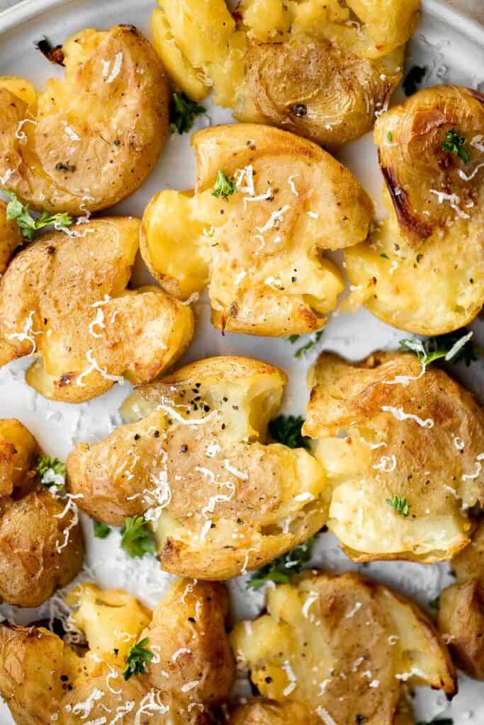 These crispy smashed potatoes are the perfect side dish. They’re easy to make, crispy on the outside, tender and fluffy on the inside, and so flavorful. | aheadofthyme.com