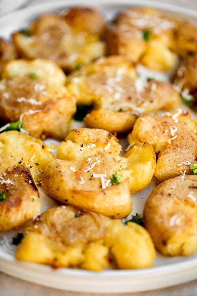 These crispy smashed potatoes are the perfect side dish. They’re easy to make, crispy on the outside, tender and fluffy on the inside, and so flavorful. | aheadofthyme.com