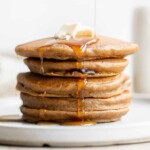 Soft and fluffy gingerbread pancakes are festive and loaded with holiday spices for the perfect breakfast on a winter morning or Christmas Day. | aheadofthyme.com