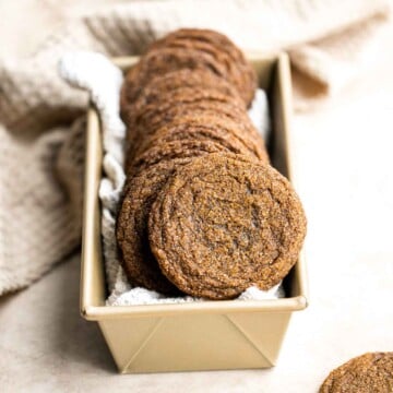 Thin crispy gingersnaps are a classic holiday cookie loaded with festive spices and molasses flavor. It's a no chill recipe that is quick and easy to make. | aheadofthyme.com