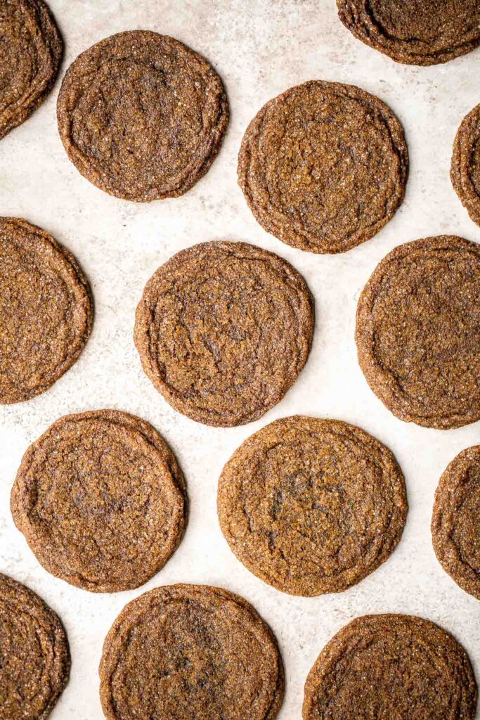 Thin crispy gingersnaps are a classic holiday cookie loaded with festive spices and molasses flavor. It's a no chill recipe that is quick and easy to make. | aheadofthyme.com