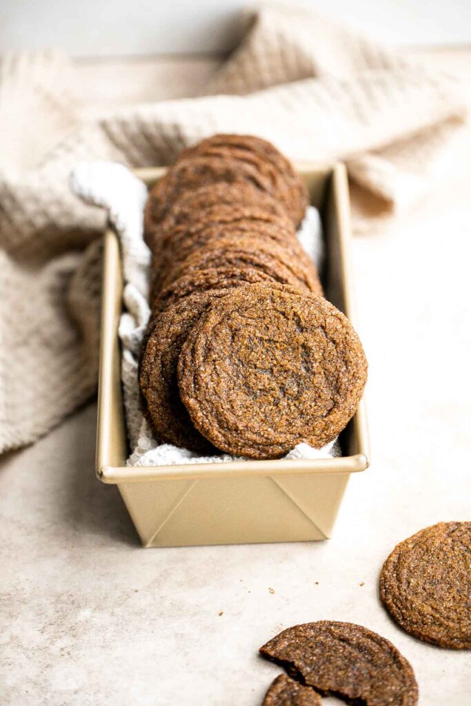 Thin crispy gingersnaps are a classic holiday cookie loaded with festive spices and molasses flavor. It's a no chill recipe that is quick and easy to make. | aheadofthyme.com