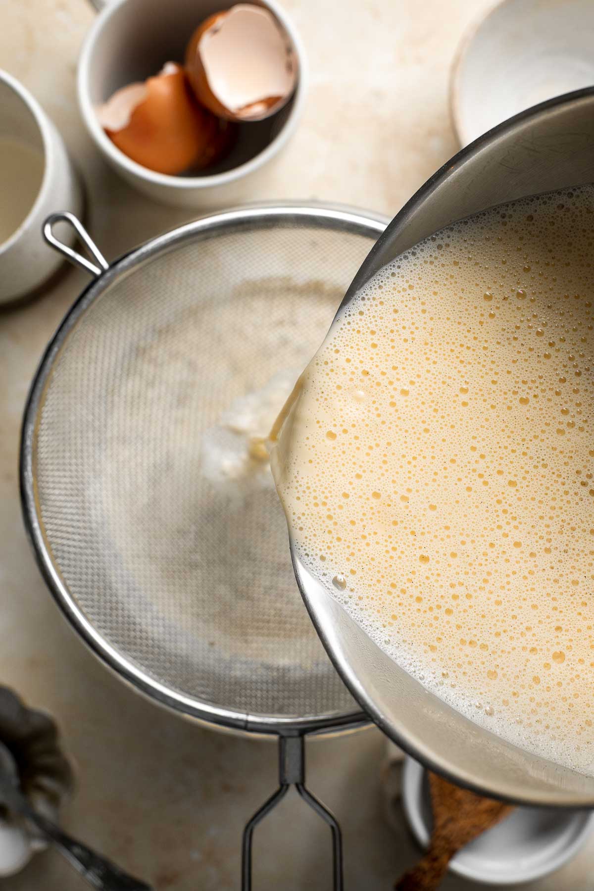 Non-alcoholic homemade eggnog is thick, sweet, creamy, and smooth. This family-friendly version of a classic holiday drink is way better than store-bought. | aheadofthyme.com