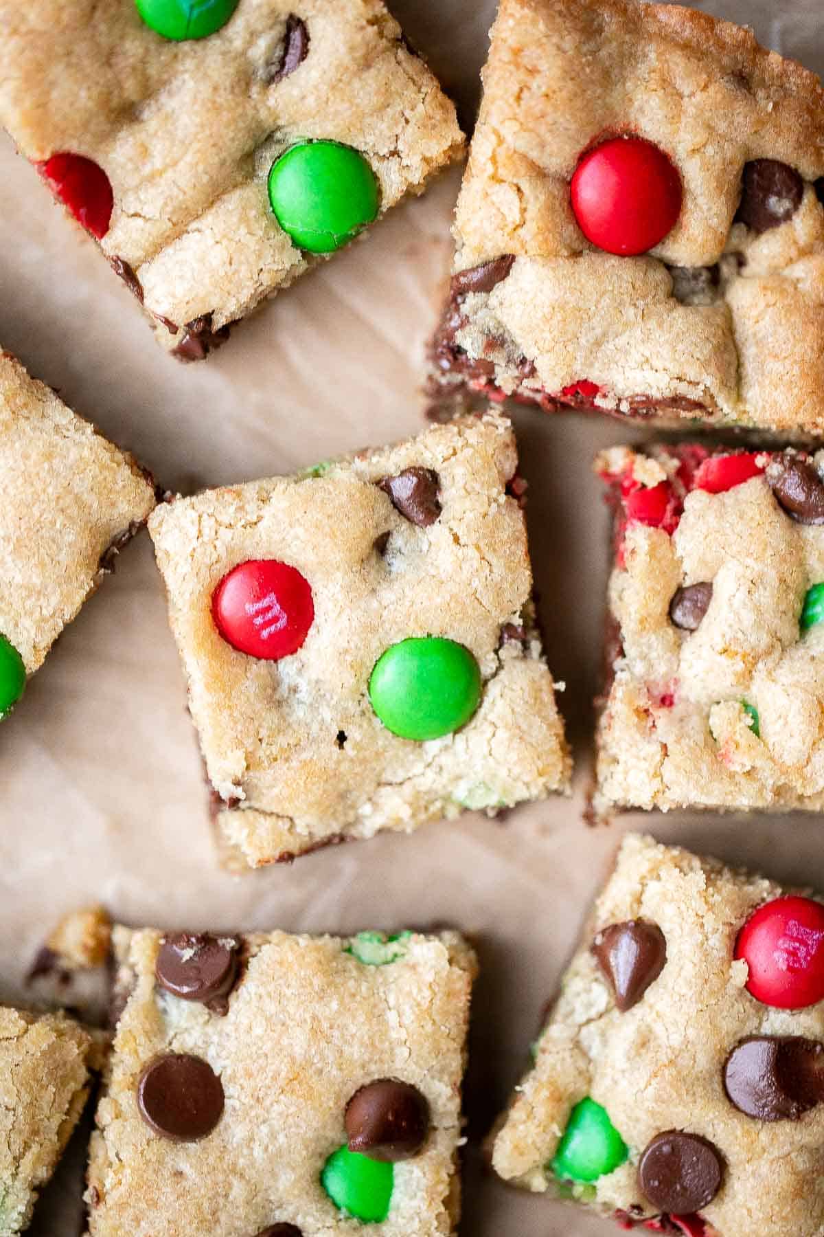 M&M cookie bars are soft and chewy, have crisp edges with a gooey center, and are loaded with M&M's and chocolate chips. The easiest way to bake cookies! | aheadofthyme.com