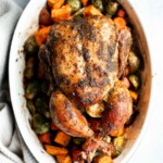 Pesto Roast Chicken is juicy, flavorful, and roasted with basil pesto over vegetables for an easy, one-pan dinner everyone loves. | aheadofthyme.com