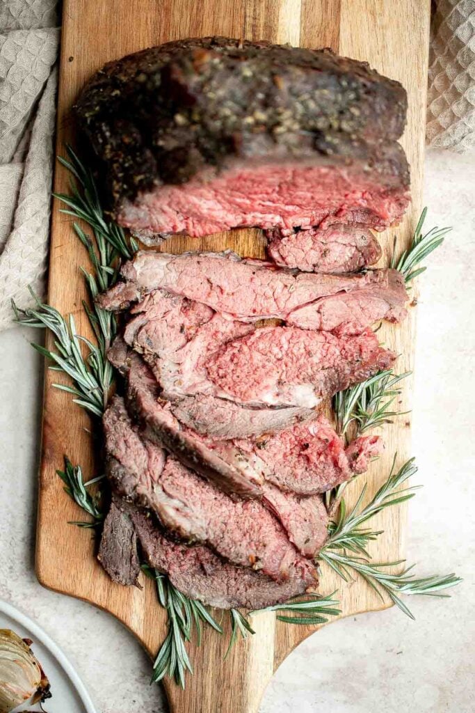 Homemade roast beef is roasted on high heat and slow cooked on low heat for the best texture — browned crust on the outside and tender, moist, juicy inside. | aheadofthyme.com