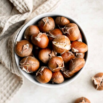 Enjoy street vendor roasted chestnuts at home in three different ways — roast in the oven, cook over the stove, or in the air fryer. | aheadofthyme.com
