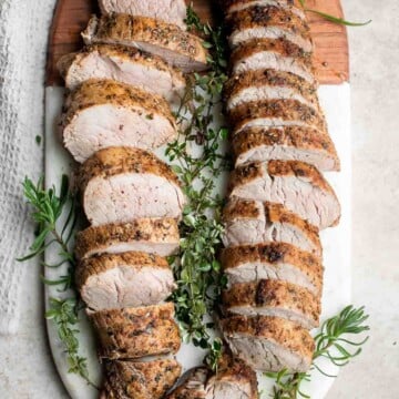 Quick easy roasted pork tenderloin with sauce is juicy, tender, and flavorful. Ready in 30 minutes, it's perfect for busy weeknights or a holiday dinner. | aheadofthyme.com