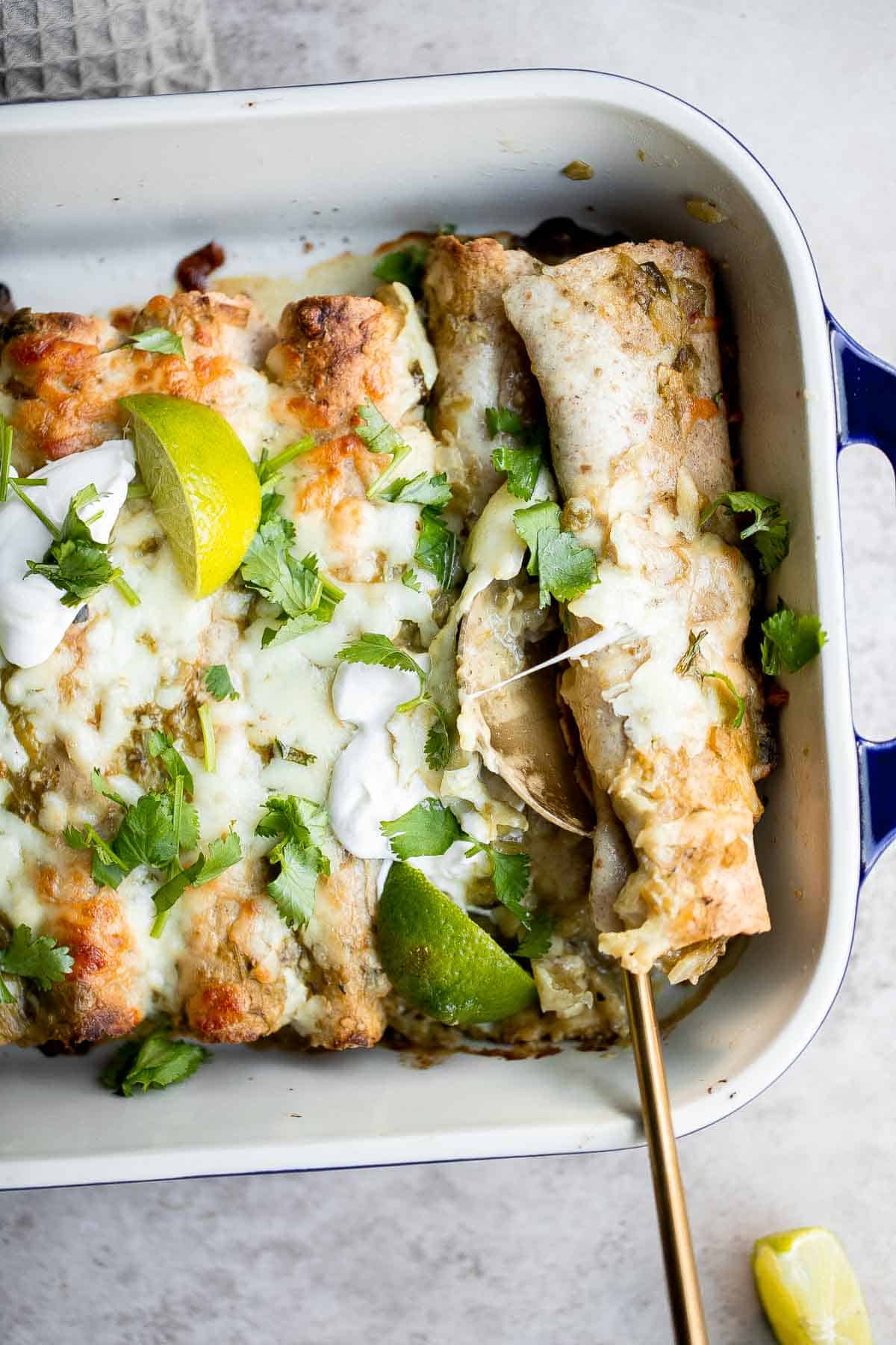 Salsa verde green chicken enchiladas are delicious and flavorful, quick and easy to make, and saucy and spicy. Authentic Mexican food ready in 40 minutes. | aheadofthyme.com