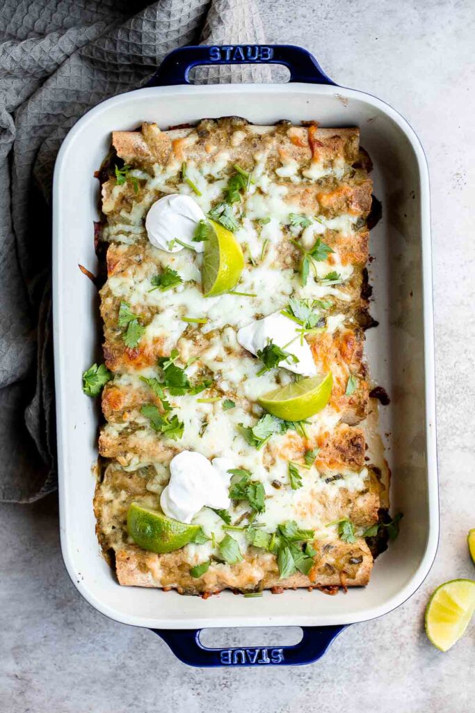 Salsa verde green chicken enchiladas are delicious and flavorful, quick and easy to make, and saucy and spicy. Authentic Mexican food ready in 40 minutes. | aheadofthyme.com