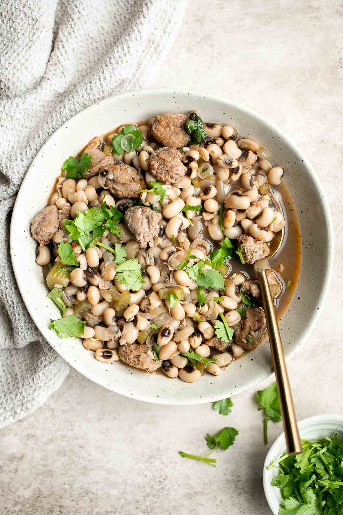 Southern Black Eyed Peas (Hoppin' John) is classic comfort food that is hearty, delicious, flavorful, and comforting. Serve it on New Year's for good luck. | aheadofthyme.com
