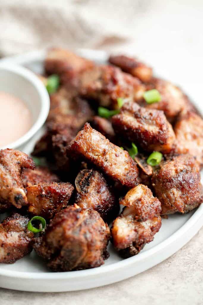 Air fryer short ribs are crispy, flavorful, and delicious. The easy marinade ensures they're tender and juicy inside, while the air fryer makes them crispy. | aheadofthyme.com
