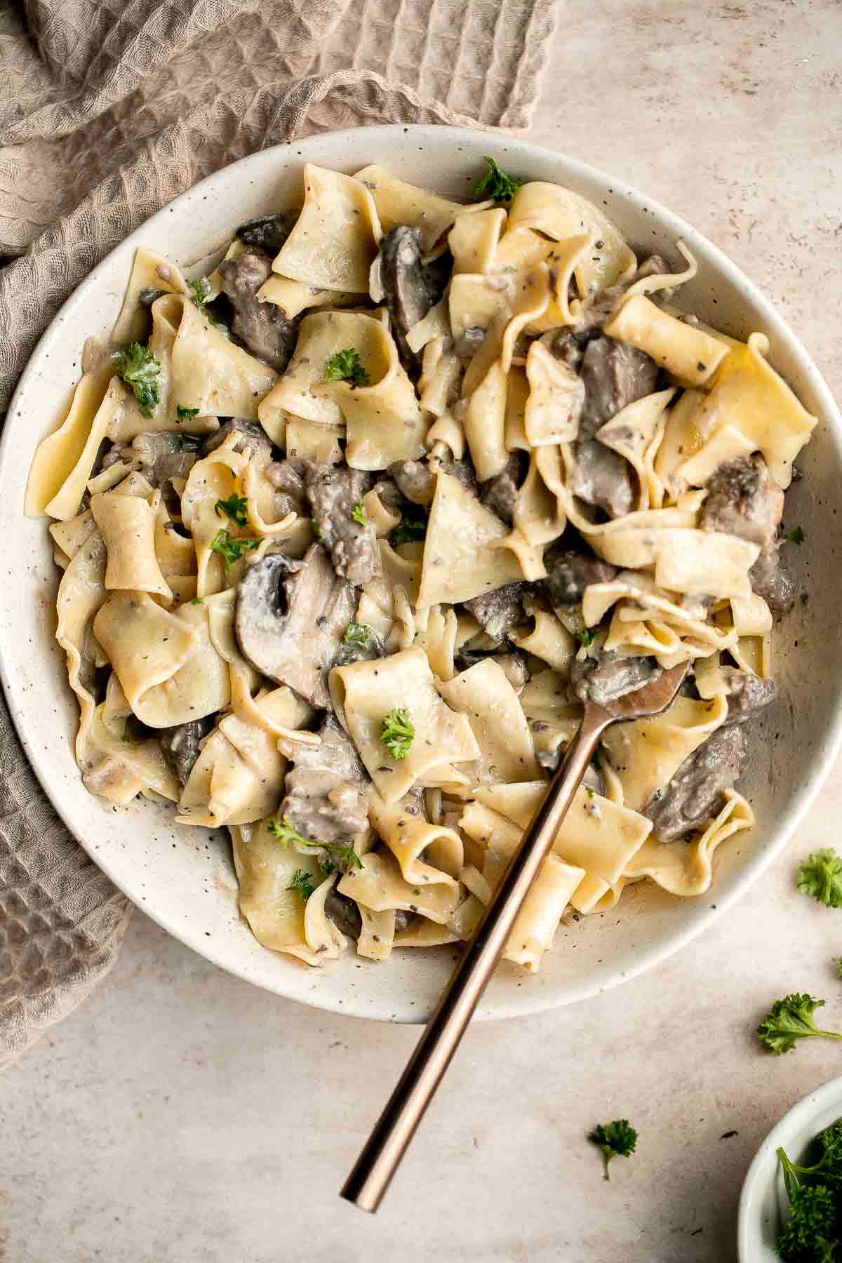 Beef stroganoff is a delicious, flavorful, and comforting Russian pasta dish that is ready in under 25 minutes. The perfect weeknight dinner. | aheadofthyme.com