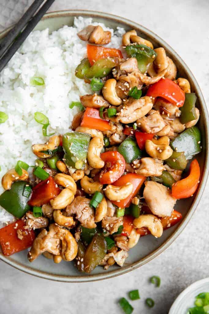 Cashew chicken is a quick and easy chicken stir fry ready in under 30 minutes. It's flavorful, delicious, and so much better and faster than takeout. | aheadofthyme.com