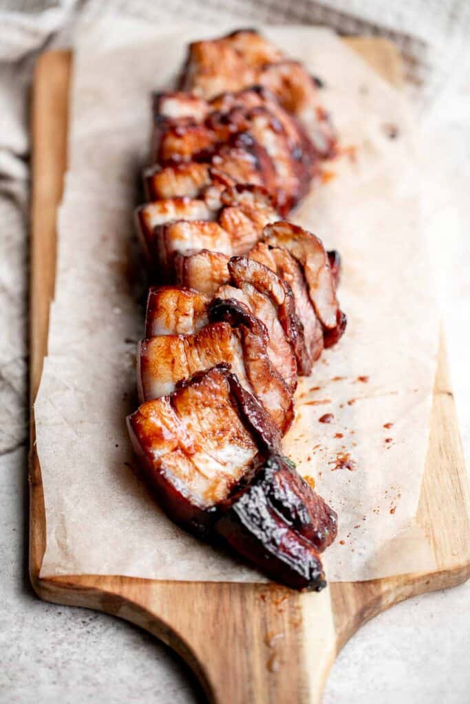 Char siu (Chinese BBQ pork) is a delicious, flavorful, traditional roasted pork dinner slathered in a distinct sticky, sweet, savory barbecue sauce glaze. | aheadofthyme.com