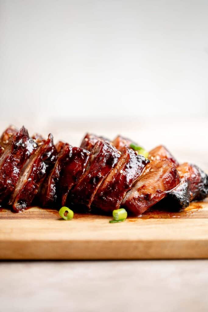 Char siu (Chinese BBQ pork) is a delicious, flavorful, traditional roasted pork dinner slathered in a distinct sticky, sweet, savory barbecue sauce glaze. | aheadofthyme.com